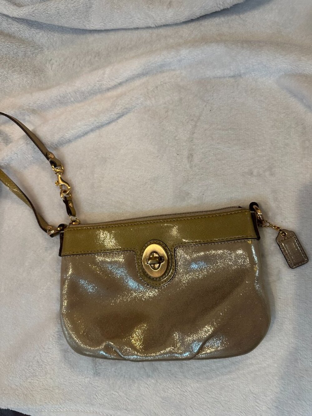 Coach shimmery gold wristlet